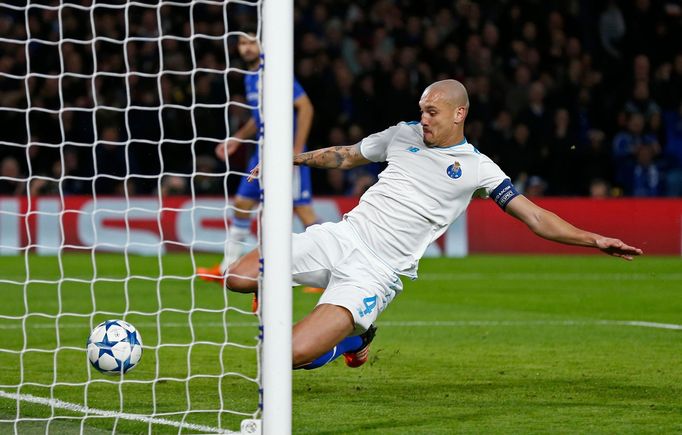 Maicon of Porto attempts to clear a deflection from Ivan Marcano as he scores an own goal for Chelsea's first goal