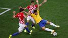 Brazil's Fred is fouled by Croatia's Dejan Lovren inside the area during their 2014 World Cup opening match at the Corinthians arena in Sao Paulo June 12, 2014. REUTERS/P