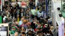 Attendees are seen inside the trade floor at the 2015 Comic-Con International in San Diego, California