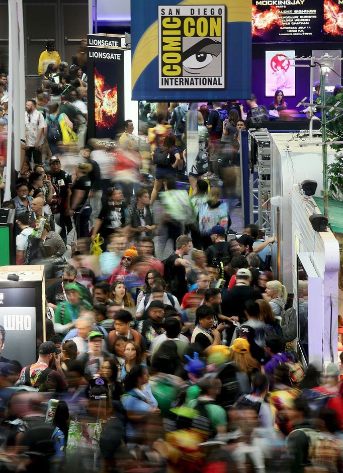 Attendees are seen inside the trade floor at the 2015 Comic-Con International in San Diego, California