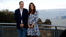 Britain's Prince William and his wife Catherine, the Duchess of Cambridge, pose for pictures during their visit to the &quot;Three Sisters&quot; rock formation in the Blu