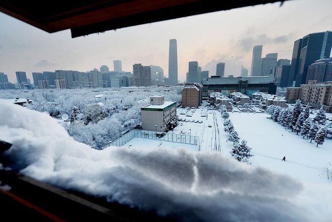 A general view shows a blanket of spring snow in Beijing on March 20, 2013. Beijing and the north of China has been experiencing it's coldest winter in more than 30 years and has seen tens of thousands of the countries livestock dying and transport chaos as flights and highways are shutdown.