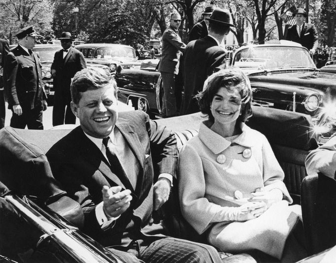 Former United States President John F. Kennedy and first lady Jackie Kennedy sit in a car in front of Blair House during the arrival ceremonies for Habib Bourguiba, president of Tunisia, in Washington, in this handout image taken on May 3, 1961.