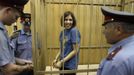 RNPS IMAGES OF THE YEAR 2012 - Nadezhda Tolokonnikova, a member of female punk band, "Pussy Riot", stands behind bars during a court hearing in Moscow July 4, 2012. Three members of the all-woman punk band "Pussy Riot" were detained on February 21, 2012, after they stormed into Moscow's main cathedral to sing a protest song against Vladimir Putin and criticised the Russian Orthodox Church's support for Putin. REUTERS/Sergei Karpukhin (RUSSIA - Tags: POLITICS CIVIL UNREST RELIGION CRIME LAW TPX IMAGES OF THE DAY) Published: Pro. 4, 2012, 1:02 dop.