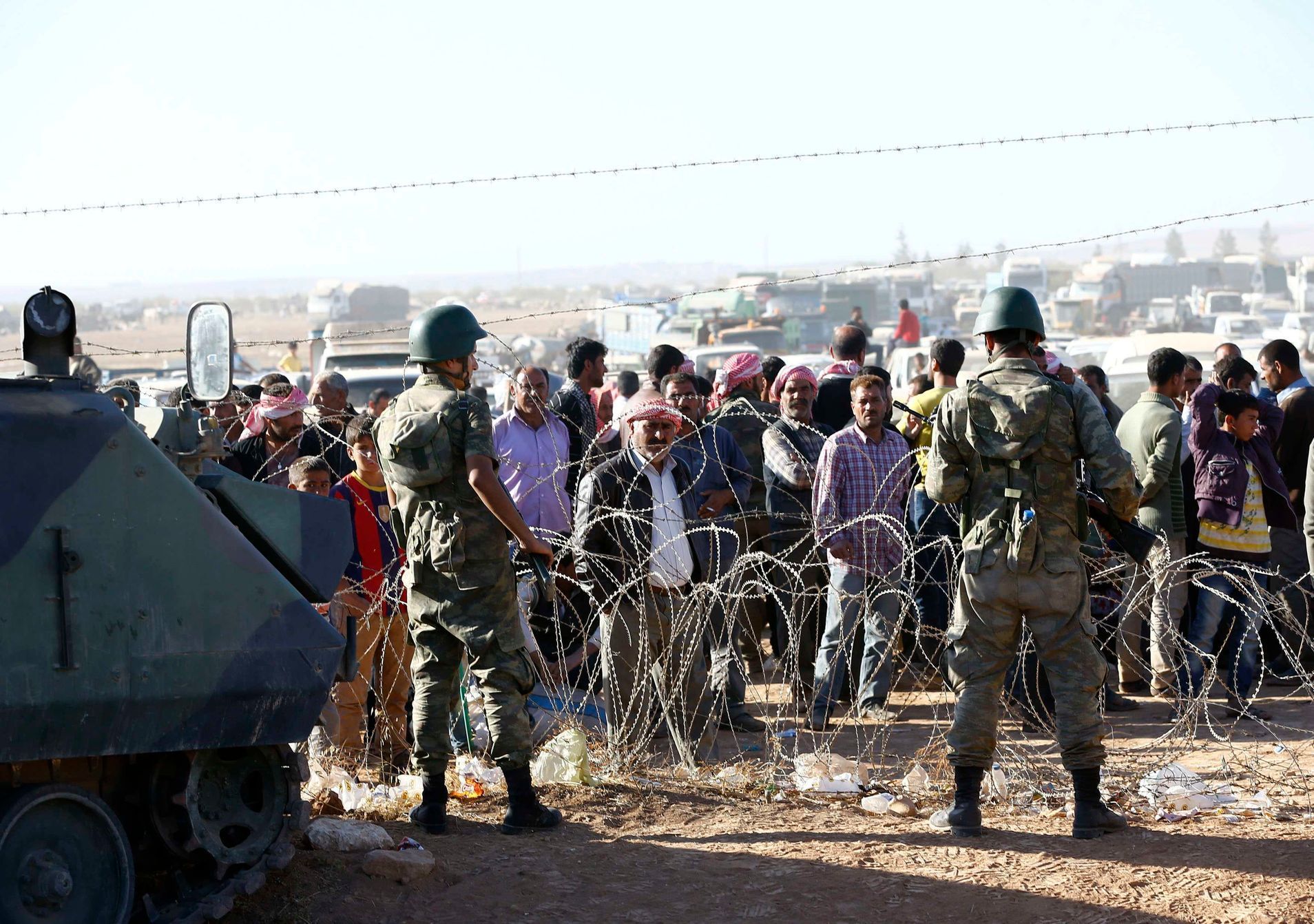 Kurdští uprchlíci u syrských hranic.