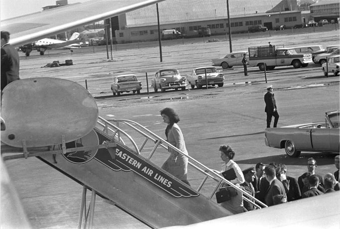 Jacqueline Kennedy (L), widow of former U.S. President John F. Kennedy, boards Air Force One at Love Field following his assassination in Dallas,Texas, in this handout image taken on November 22, 1963. Friday, November 22, 2013, will mark the 50th anniversary of JFK's assassination.