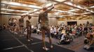 Full-body tattoo competitors show their art to an audience during judging at the National Tattoo Association Convention in Cincinnati, Ohio April 13, 2012. The hobby of collecting tattoos has exploded into the mainstream of society with tattoo conventions and festivals held year-round across the United States and the world. Picture taken April 13, 2012. REUTERS/Jason Reed (UNITED STATES - Tags: SOCIETY) ATTENTION EDITORS PICTURE 22 OF 31 FOR PACKAGE 'ADDICTED TO THE NEEDLE' TO FIND ALL PICTURES SEARCH 'ADDICTED NEEDLE' Published: Čer. 29, 2012, 1 odp.