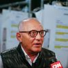 Designer Max Azria is interviewed backstage before showing the BCBG Max Azria collection during New York Fashion Week
