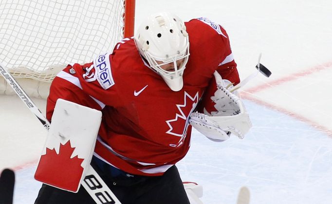 Canada's goalie Ben Scrivens saves during their men's ice hockey World Championship quarter-final game against Finland at Chizhovka Arena in Minsk May 22, 2014. REUTERS/V