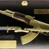A gold plated Kalashnikov is seen on display at the 'Top Secret' Spy Museum in Oberhausen, July 10, 2013. The museum presents various objects, devices and gadgets used for spying or related to espionage. REUTERS/Ina Fassbender (GERMANY - Tags: SOCIETY ENTERTAINMENT) Published: Čec. 10, 2013, 2:57 odp.