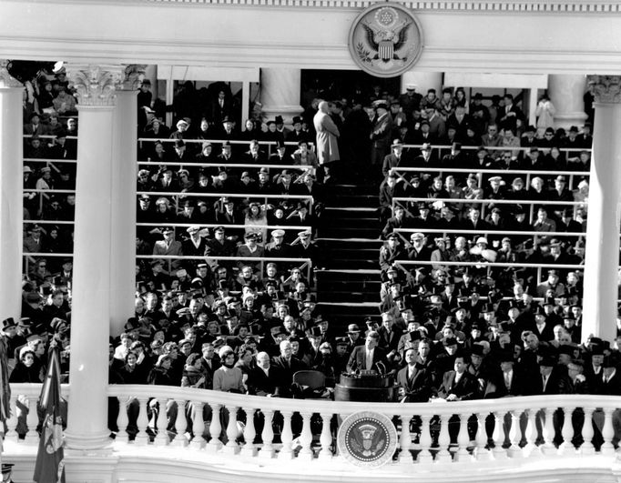 Former United States President John F. Kennedy (C) speaks during his inauguration ceremonies at the Capitol in Washington, in this handout photograph taken on January 20, 1961.