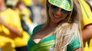 A Brazilian fan attends the opening ceremony of the 2014 World Cup at the Corinthians arena in Sao Paulo June 12, 2014. REUTERS/Kai Pfaffenbach (BRAZIL - Tags: SOCCER SPO