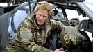 Britain's Prince Harry speaks during an interview with media at Camp Bastion, southern Afghanistan in this photograph taken December 12, 2012, and released January 21, 2013. The Prince, who is serving as a pilot/gunner with 662 Squadron Army Air Corps, is on a posting to Afghanistan that runs from September 2012 to January 2013. Photograph taken December 12, 2012. REUTERS/John Stillwell/Pool (AFGHANISTAN - Tags: MILITARY POLITICS SOCIETY MEDIA ROYALS CONFLICT) Published: Led. 21, 2013, 7:40 odp.