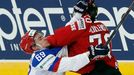 Russia's Alexander Burmistrov (L) clashes with Switzerland's Denis Hollenstein (R) during their men's ice hockey World Championship Group B game at Minsk Arena in Minsk M