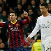 Barcelona's Lionel Messi celebrates a goal next to Real Madrid's Cristiano Ronaldo during La Liga's second 'Clasico' soccer match of the season in Madrid