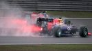 Red Bull Racing Formula One driver Daniel Ricciardo of Australia (R) and Toro Rosso Formula One driver Daniil Kvyat of Russia drive during the third practice session of t