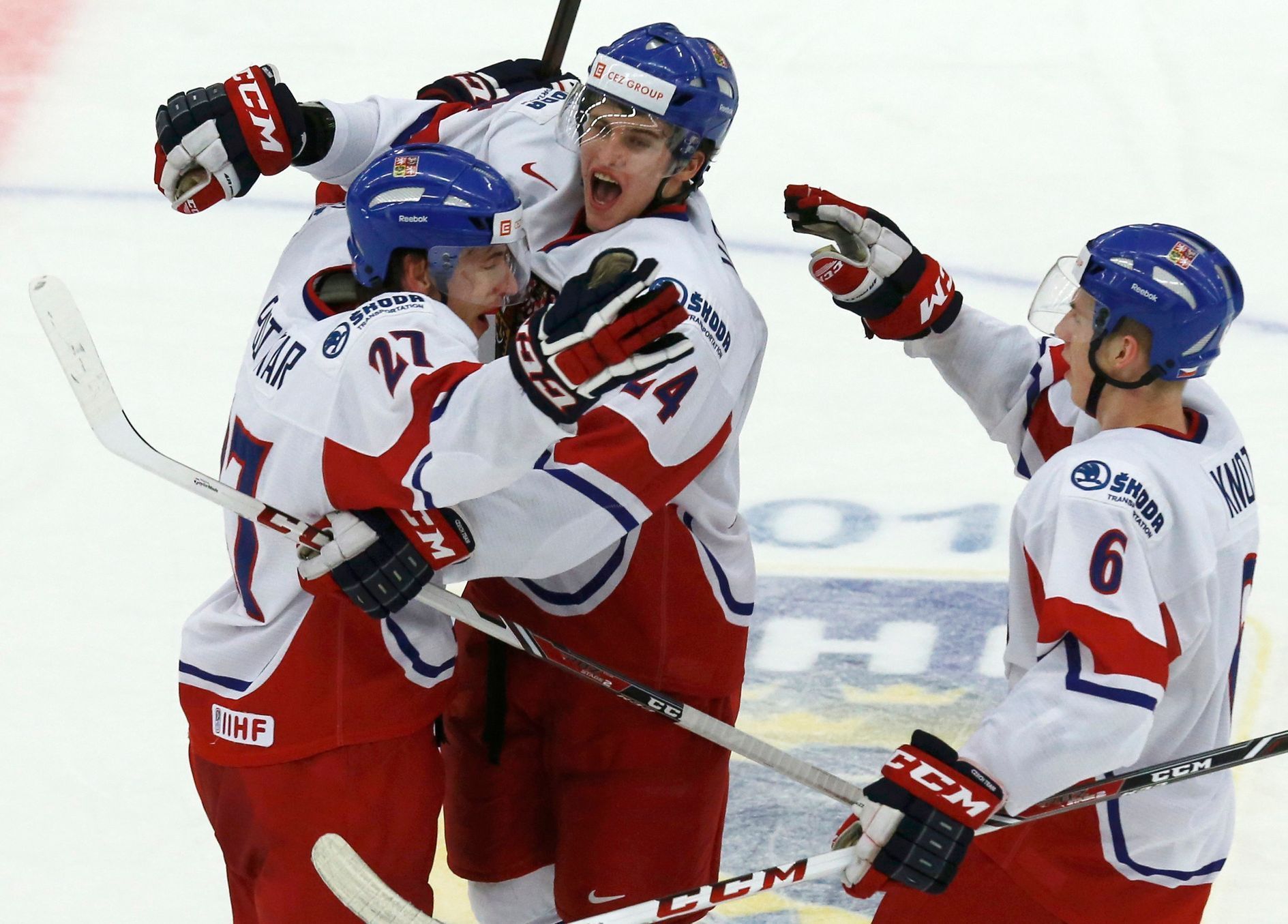 Czech Republic's Plutnar celebrates his goal against Canada with teammates Vrana and Knot during the second period of their IIHF World Junior Championship ice hockey game in Malmo