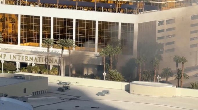 Smoke rises after a Tesla Cybertruck burned at the entrance of Trump Tower in Las Vegas, Nevada, U.S., January 1, 2025, in this screengrab from a video obtained from soci