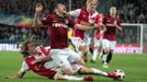 Fotbalista klubu AC Sparta Praha Andrej Kerič padá přes Milana Černého ze Slávie v utkání Gambrinus ligy.