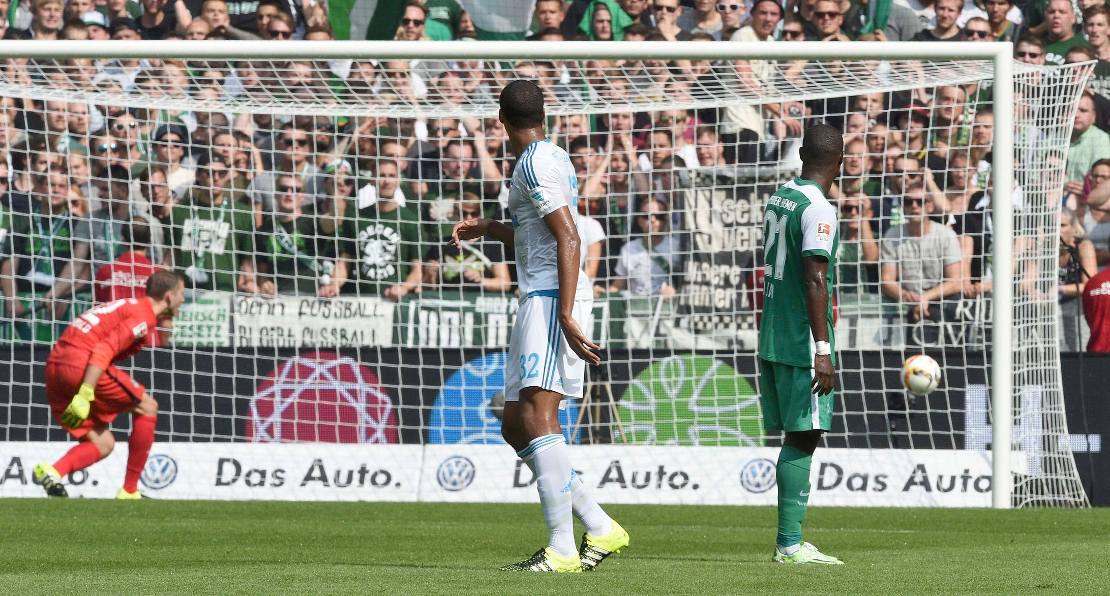 Schalke 04's Matip and Werder Bremen's Ujah react as Weder Bremen's Selassie scores an own goal during the German Bundesliga first division soccer match against Schalke 04 in Bremen