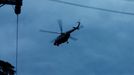 A military helicopter believed to be carrying rescued schoolboys takes off near Tham Luang cave complex in the northern province of Chiang Rai