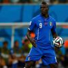 Italy's Mario Balotelli holds the ball during their 2014 World Cup Group D soccer match against England at the Amazonia arena in Manaus