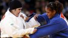 Saudi Arabia's Wojdan Shaherkani (L) fights with Puerto Rico's Melissa Mojica during their women's +78kg elimination round of 32 judo match at the London 2012 Olympic Games August 3, 2012. REUTERS/Kim Kyung-Hoon (BRITAIN - Tags: SPORT JUDO SPORT OLYMPICS) Published: Srp. 3, 2012, 9:48 dop.