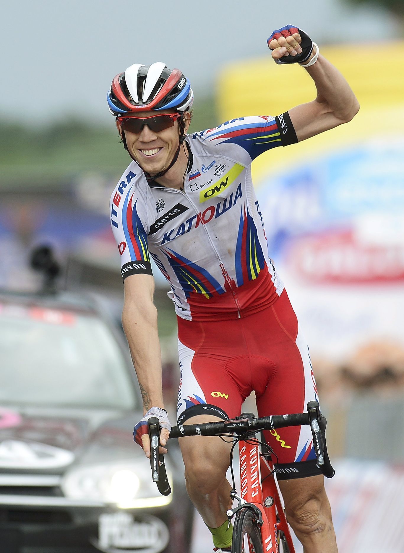 Team Katusha rider Zakarin of Russia celebrates after winning the 153 km eleven stage of the 98th Giro d'Italia cycling race from Forli to Imola