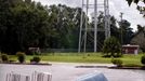 In this Sept. 7, 2004 file photo, a sinkhole approximately 10 feet deep swallowed this automobile in the parking lot of Hitchcocks Foodliner in Archer, Fla. (AP Photo/The Gainsville Sun, Jim Matthews)