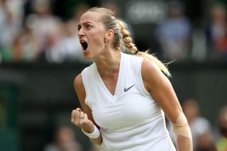 FILE PHOTO: Tennis - Wimbledon - All England Lawn Tennis and Croquet Club, London, Britain - July 8, 2019  Czech Republic's Petra Kvitova reacts during her fourth round m