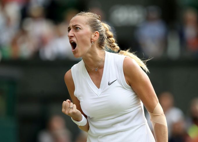 FILE PHOTO: Tennis - Wimbledon - All England Lawn Tennis and Croquet Club, London, Britain - July 8, 2019  Czech Republic's Petra Kvitova reacts during her fourth round m