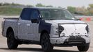 FILE PHOTO: U.S. President Joe Biden tests the new Ford F-150 Lightning truck as he visits VDAB at Ford Dearborn Development Center in Dearborn, Michigan, U.S., May 18, 2