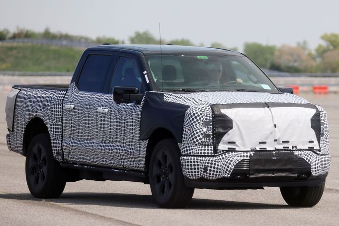 FILE PHOTO: U.S. President Joe Biden tests the new Ford F-150 Lightning truck as he visits VDAB at Ford Dearborn Development Center in Dearborn, Michigan, U.S., May 18, 2