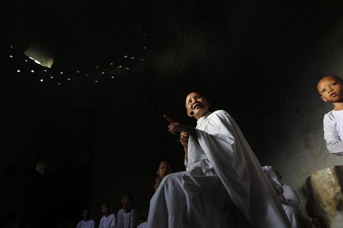 A Buddhist nun speaks at the Sathira Dammasathan Buddhist meditation centre in Bangkok