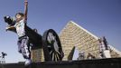 A boy plays at the tomb of late President Anwar Sadat during the 40th anniversary of Egypt's attack on Israeli forces in the 1973 war, at Cairo's Nasr City district, October 6, 2013.