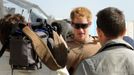 Britain's Prince Harry speaks during an interview with media at Camp Bastion, southern Afghanistan in this photograph taken November 1, 2012, and released January 21, 2013. The Prince, who is serving as a pilot/gunner with 662 Squadron Army Air Corps, is on a posting to Afghanistan that runs from September 2012 to January 2013. Photograph taken November 1, 2012. REUTERS/John Stillwell/Pool (AFGHANISTAN - Tags: MILITARY POLITICS SOCIETY MEDIA ROYALS CONFLICT) Published: Led. 21, 2013, 7:55 odp.