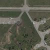 FILE PHOTO: Satellite view shows damaged planes and tarmac at Russian Belaya airfield