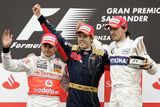 Tři nejlepší v Monze, zleva druhý Kovalainen, vítezný Vettel a třetí Kubica