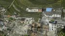 An aerial view shows houses damaged after a strong earthquake in Lushan county, Ya'an, Sichuan province, April 20, 2013. At least fifty-six people were killed and more than 500 others injured in the earthquake, according to Xinhua News Agency. REUTERS/China Daily (CHINA - Tags: DISASTER ENVIRONMENT TPX IMAGES OF THE DAY) CHINA OUT. NO COMMERCIAL OR EDITORIAL SALES IN CHINA Published: Dub. 20, 2013, 6:06 dop.