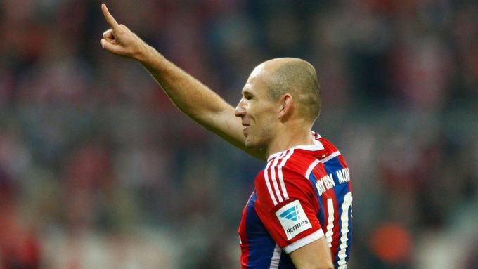 Arjen Robben slaví vítězný gól Bayernu Mnichov.