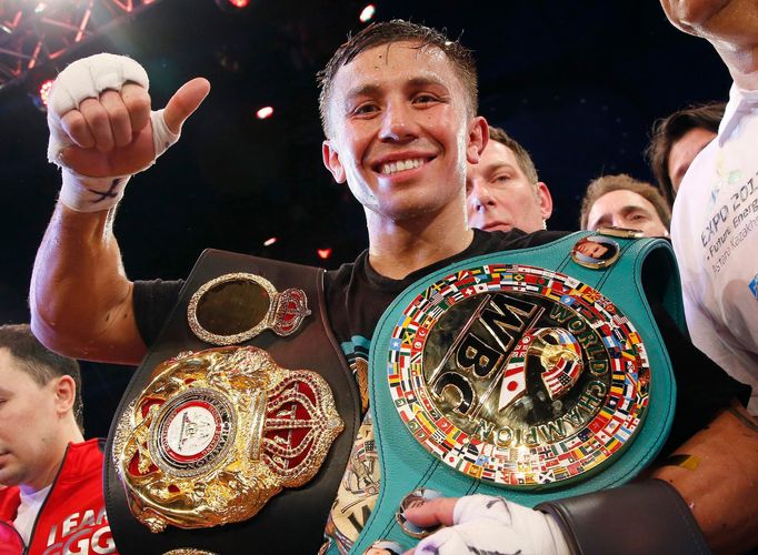 World champion Gennadiy Golovkin of Kazakhstan reacts after defeating Martin Murray of England during the WBA-WBC-IBO Middleweight World Championship in Monte Carlo, earl