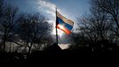 A Russian flag flutters on a barricade in front of a Ukrainian airbase in Kramatorsk, in eastern Ukraine April 15, 2014.