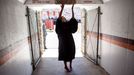 May 11, 2012 "Lawrence Jackson made this great photograph of the First Lady touching the Hokie Stone before walking onto the field at Lane Stadium to give the Virginia Tech commencement address in Blacksburg, Va."