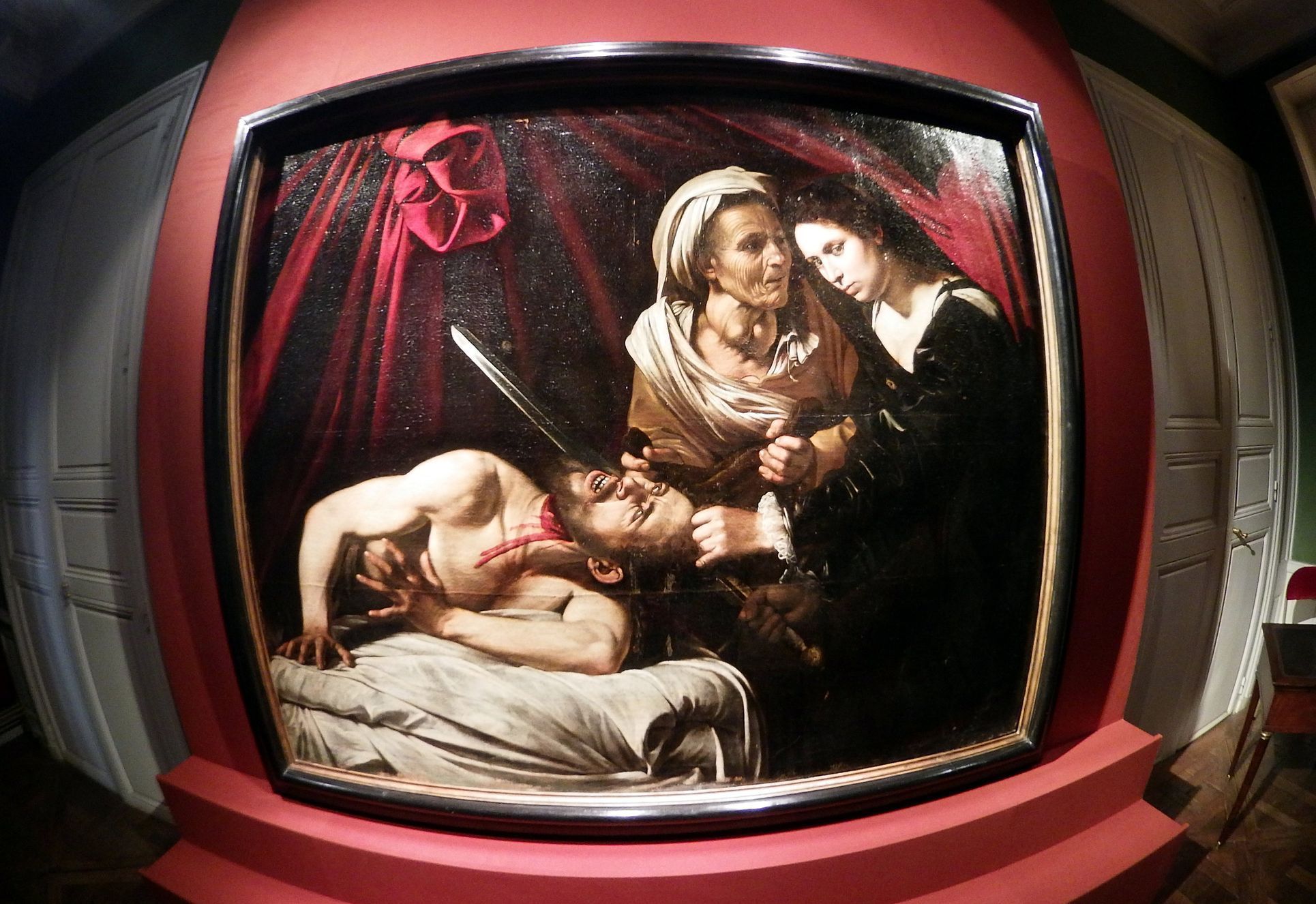 A painting entitled &quot;Judith Beheading Holofernes&quot; is pictured during its presentation in Paris