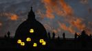 Lighting, illuminating Saint Peter's Square, is seen near the dome of Saint Peter's Basilica at the Vatican March 9, 2013. Roman Catholic cardinals will enter a conclave to elect a successor to Pope Benedict on March 12, the Vatican said on Friday, with no clear favorite emerging so far to take charge of the troubled Church. REUTERS/Eric Gaillard (VATICAN - Tags: RELIGION) Published: Bře. 9, 2013, 9:41 odp.