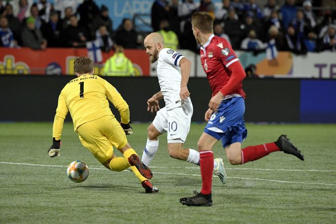 Soccer Football - Euro 2020 - Group J Qualification - Finland v Liechtenstein - Helsinki, Finland November 15, 2019. Teemu Pukki of Finland vies with goalkeeper Benjamin