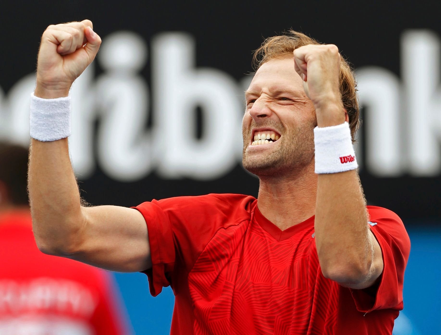 Stephane Robert of France celebrates defeating Martin Klizan of Slovakia during their men's singles match at the Australian Open 2014 tennis tournament in Melbourne