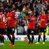 Manchester United's Anderson and Evans react after Grigg of Milton Keynes Dons scored their second goal during their League Cup soccer match at stadiummk in Milton Keynes