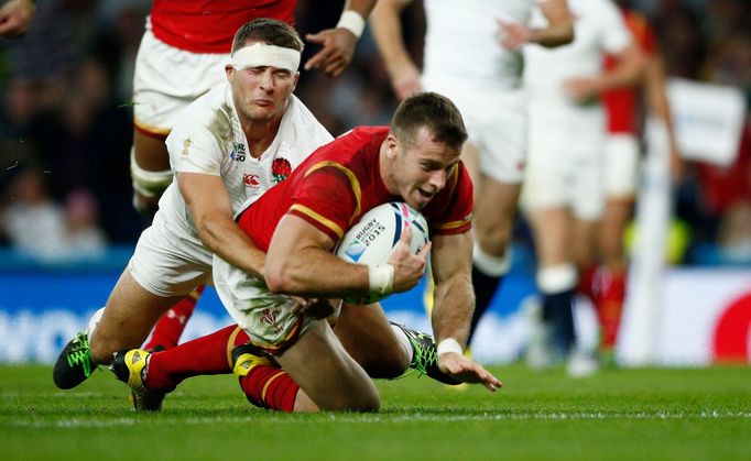 Gareth Davies of Wales scores the first try for his side