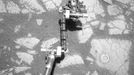 Opportunity's Arm and 'Gagarin' Rock, Sol 405 NASA's Mars Exploration Rover Opportunity used its rock abrasion tool on a rock informally named "Gagarin" during the 401st and 402nd Martian days, or sols, of the rover's work on Mars (March 10 and 11, 2005). This image, taken by Opportunity's navigation camera on Sol 405 (March 14, 2005), shows the circular mark left on the rock. The circle is about 4.5 centimeters (1.8 inches) in diameter. At the end of the rover's arm, the tool turret is positioned with the rock abrasion tool pointing upward in this image. The abrasion target on the rock Gagarin was informally named "Yuri." A view taken by Opportunity's microscopic imager after the target was brushed by the rock abrasion tool is at http://photojournal.jpl.nasa.gov/catalog/PIA07480 . NASA's Jet Propulsion Laboratory, a division of the California Institute of Technology in Pasadena, manages the Mars Exploration Rover Project for the NASA Science Mission Directorate, Washington. Image credit: NASA/JPL-Caltech